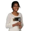 Young girl holding microphone