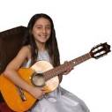 Young girl playing guitar